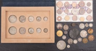 A group of coins, containing pt George V coin set, Indian Rupee, etc.