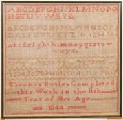 A mid 19th century needlework alphabet sampler by Eleanor Butler, 11 years old, 1844, 32.