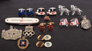 A 1936 Berlin Olympics Visitor's enamel badge and 1964 penknife, maker Rostfrei,