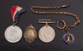 A 9ct gold Lovat Scout fob on a gold plated chain, together with a 1939 - 45 War Medal,