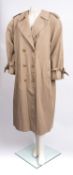 Burberry. A lady's trench coat, size 14 long.