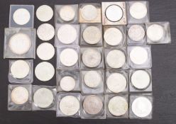 Approx nineteen, mainly silver, crown sized coins, including silver Australian Kookaburra,
