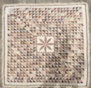 An 18th century patchwork quilt,