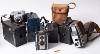 A collection of various cameras,