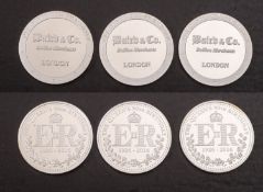 Three one ounce fine silver bullion coins.