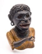 A cast iron Dinah mechanical money bank with stamped name and Rd no. 19cm high.