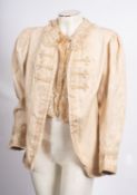 A late Victorian lady's cream silk jacket by Kate Reily, Ltd.