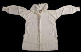 A mid 18th century boy's best linen shirt, embodied initials R W over I, with tall stand collar,