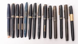A collection of fourteen various fountain pens comprising eight Waterman's fountain pens,
