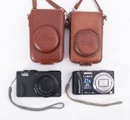 A Panasonic DMC-TZ20 digital camera and a Panasonic DMC-TZ60 digital camera,