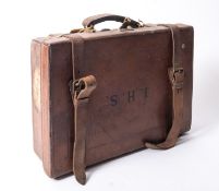 An early 20th century brown leather cartridge case, maker Charles Lancaster, London,