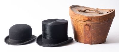 A black silk top hat, maker Tress & Co.