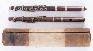 A cocuswood and silver plated piccolo, maker Army and Navy Co.