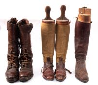 A pair of brown leather laced riding boots,