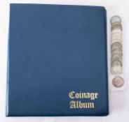 An album of coins including pre 1920 and pre 1947 half crowns and shillings, including George III,