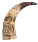 An early 19th century scrimshaw powder flask made from a cow's horn,