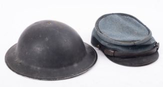 A WWII Mark II steel helmet together with a French blue cloth kepi