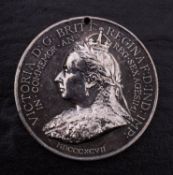 A 1897 Jubilee silver medallion, 'The Royal family. 2' (pierced).