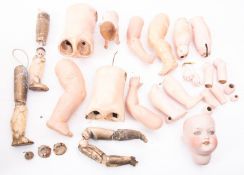 Estate of a doll restorer: composition doll body parts; an Armand marseille bisque doll's head, 390,