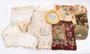An embroidered tablecloth, eleven embroidered napkins, Edwardian panel roguish Tom & Little Kate.