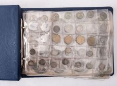 An album of coins containing British pre 1947 and pre 1920 coins,