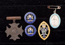 Two silver and enamel Southern Rhodesia Nursing Training School badges, maker J R gaunt, London,