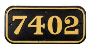A replica brass engine plate '7402', 30cm by 64.