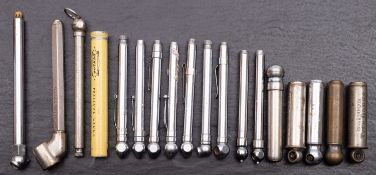 A collection of various nickel-plated tire pressure gauges,