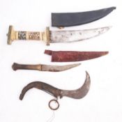 An Indian curved steel folding knife,