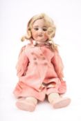 An SFBJ bisque head doll 'Sheelagh' circa 1900.