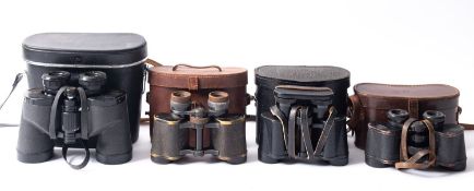 Seven pairs of various cased binoculars,