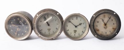 Four various Smiths dashboard clocks
