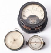 A circular aneroid barometer signed D.