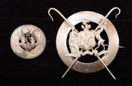 A white metal brooch in the form of the Edinburgh Coat of Arms, unsigned,