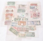 A collection of British and world bank notes, including East Lsthian? £1 note,