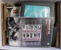 An accumulation of stamps and covers in stockbooks and binders with Great Britain mint decimal