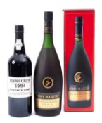 A bottle of Remy Martin VSOP and 1994 Cockburn Port