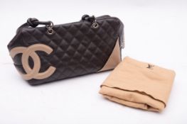 Chanel Cambon Ligne brown leather quilted handbag, with serial number '9503966',