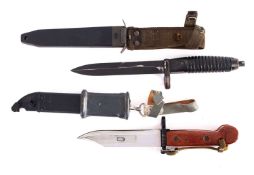 A German G3 bayonet in scabbard together with an East German .