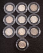 Ten George VI six pences.