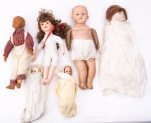 Estate of a doll restorer: a mixed collection of dolls, including two wax head dolls,