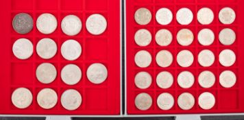 Two Lidner coin trays, containing crowns and half crown. Crowns including, 1887/1935/1937 etc.