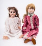 Two Armand Marseille bisque head dolls, both with applied wigs, blue glass sleeping eyes ,