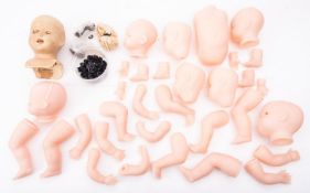 A collection of various wax doll and other doll body sections (a lot)
