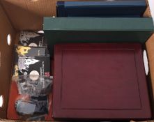 A box containing four £5 coins, one USA dollar, 1935 Rocking Horse crown, two LSD sets, Emblem set,