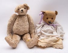 Two early to mid 20th century gold plush teddy bears,