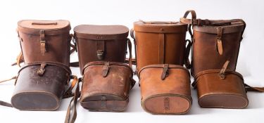 Two WW2 dated brown leather binocular cases,