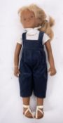 Estate of a doll restorer: Sasha doll, Maria, dressed in original blue dungarees,