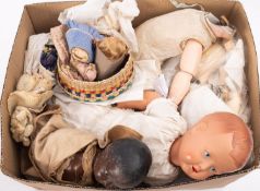 A collection of various dolls and doll parts, together with a collection of dolls whitewear.
