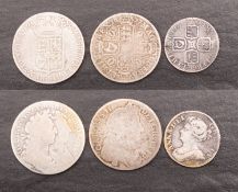 A 1689 William and Mary Half crown, 1677 Charles II Halfcrown, and Queen Anne 1709 Shilling.